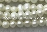 FWP05 14.5 inches 2mm - 2.5mm potato white freshwater pearl strands