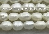 FWP157 14.5 inches 3mm - 4mm rice white freshwater pearl strands
