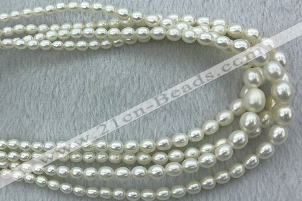 FWP212 15 inches 4mm - 9mm rice white freshwater pearl strands