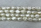 FWP286 15 inches 9mm - 10mm baroque white freshwater pearl strands