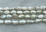 FWP353 15 inches 9mm - 10mm baroque white freshwater pearl strands